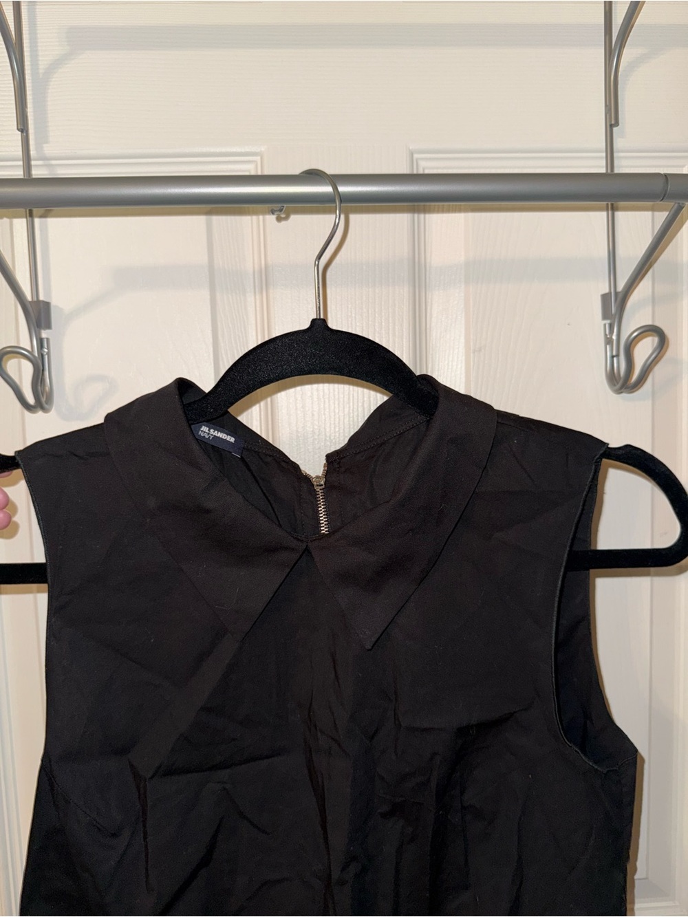 Jil Sander Navy Top, featuring a full zip closure in the back